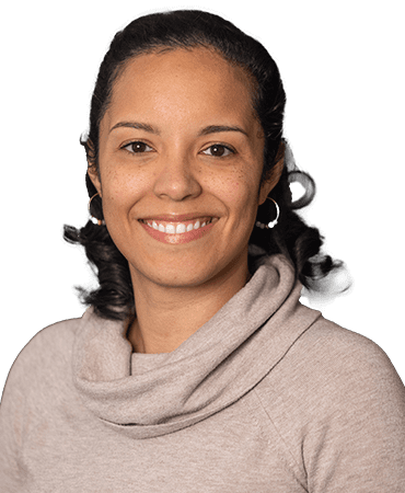 Headshot of a woman wearing a cowl neck sweater.