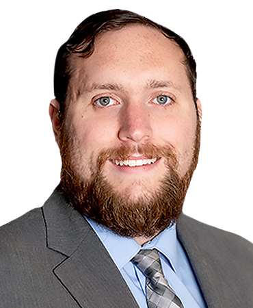 Ryan Page Man in suit with a beard and tie.